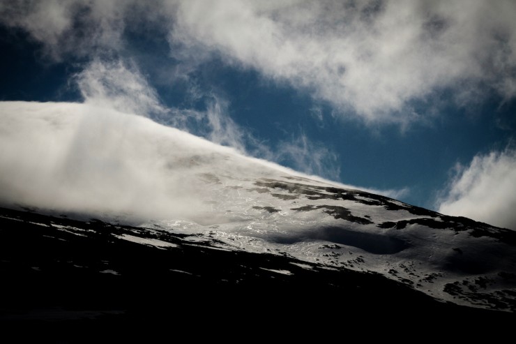 Cloud clings to a ridge.